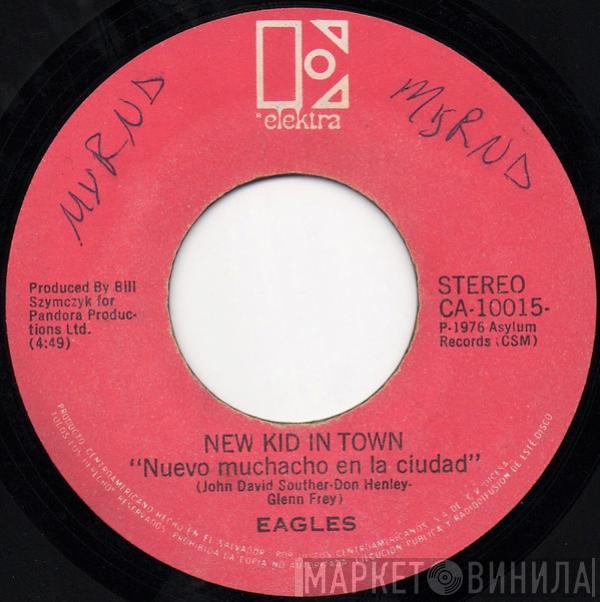  Eagles  - New Kid In Town = Nuevo Muchacho En La Ciudad / Victim Of Love = Victima Del Amor