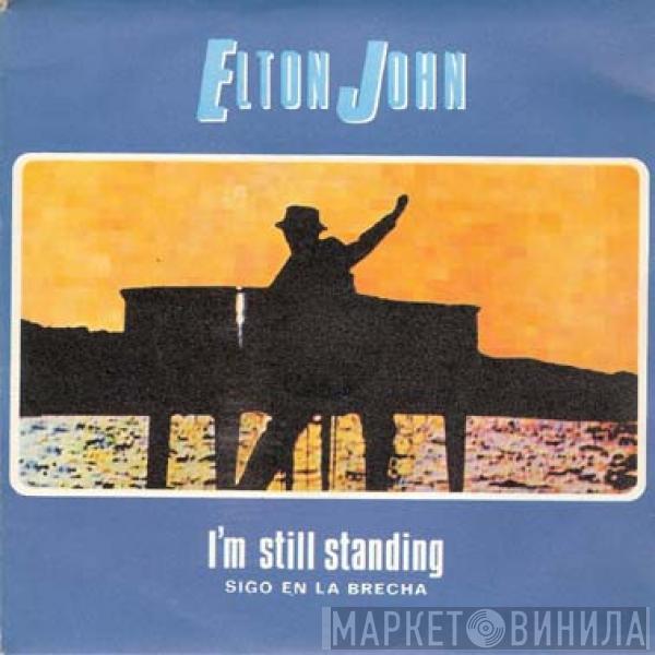 Elton John - I'm Still Standing = Sigo En La Brecha