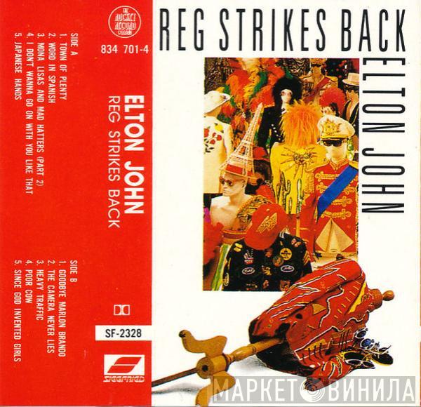  Elton John  - Reg Strikes Back