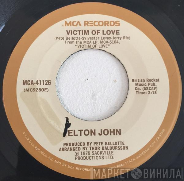  Elton John  - Victim Of Love