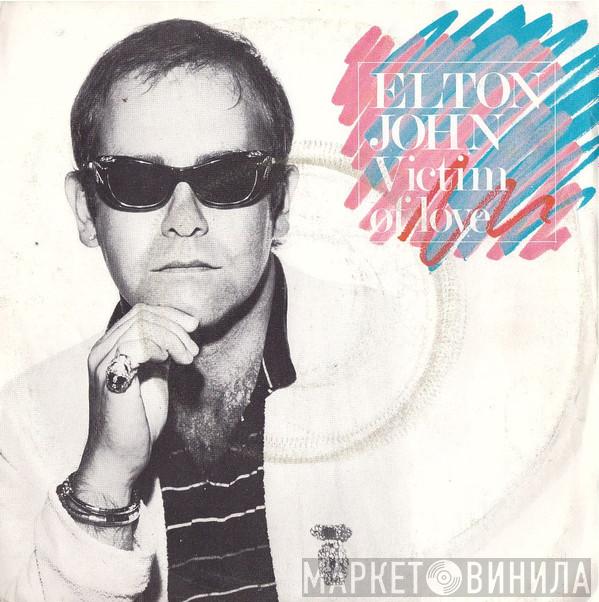  Elton John  - Victim Of Love