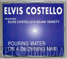  Elvis Costello  - Pouring Water On A Drowning Man
