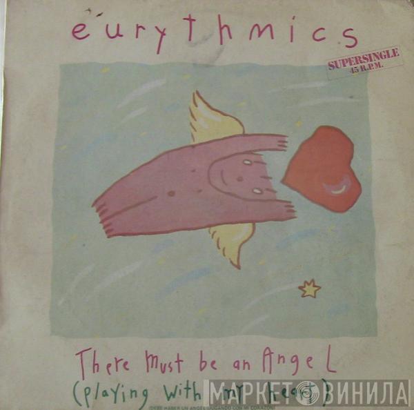  Eurythmics  - There Must Be An Angel (Playing With My Heart) = Debe Haber Un Angel (Jugando Con Mi Corazon)