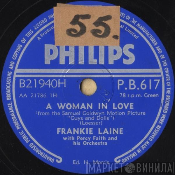 Frankie Laine - A Woman In Love / Make Me A Child Again