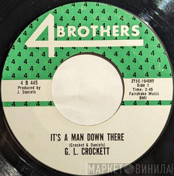 G.L. Crockett - It's A Man Down There