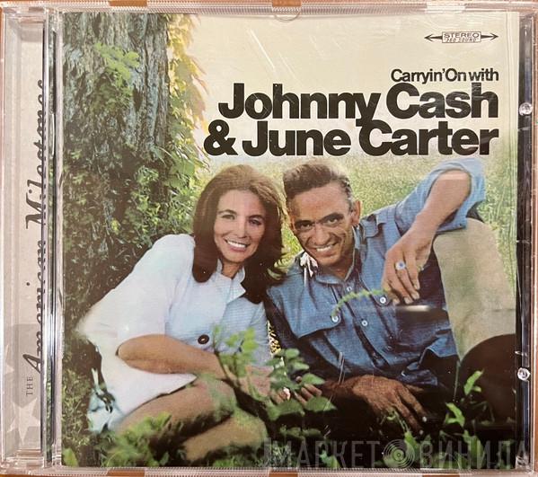  Johnny Cash & June Carter Cash  - Carryin' On With