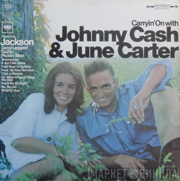  Johnny Cash & June Carter Cash  - Carryin' On With