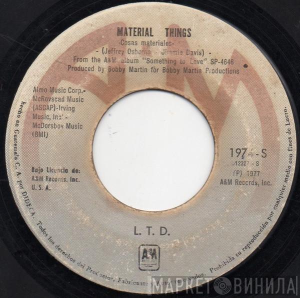  L.T.D.  - (Every Time I Turn Around) Back In Love Again