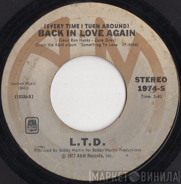 L.T.D. - (Every Time I Turn Around) Back In Love Again