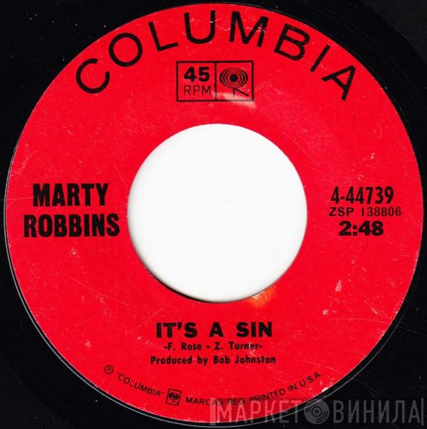  Marty Robbins  - It's A Sin / I Feel Another Heartbreak Coming On