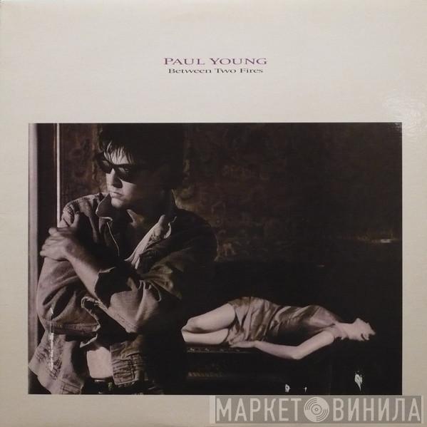  Paul Young  - Between Two Fires