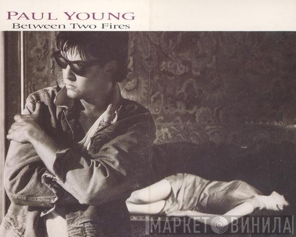  Paul Young  - Between Two Fires