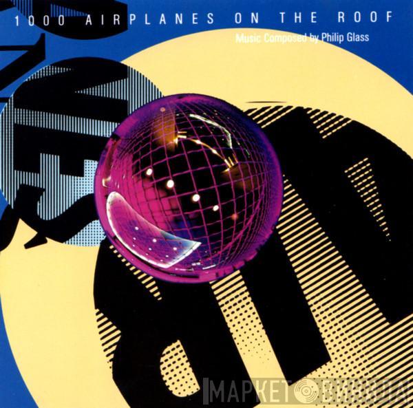  Philip Glass  - 1000 Airplanes On The Roof