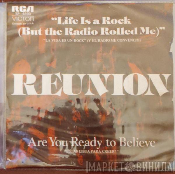  Reunion   - Life Is A Rock (But The Radio Rolled Me) = La Vida Es Un Rock (Y El Radio Me Convenció) / Are You Ready To Believe = Estás Lista Para Creer?