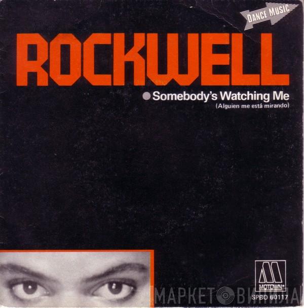 Rockwell - Somebody's Watching Me = Alguien Me Está Mirando