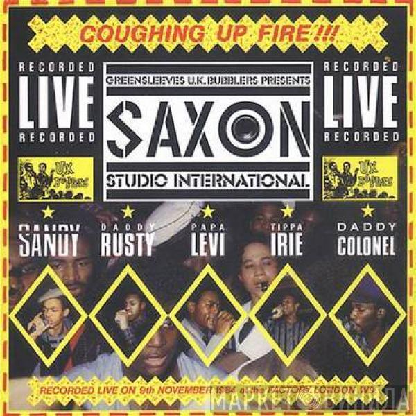  - Saxon Studio International Coughing Up Fire