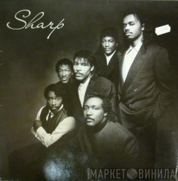 Sharp  - Sharp