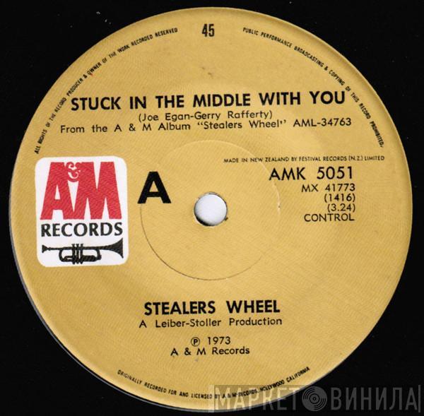  Stealers Wheel  - Stuck In The Middle With You