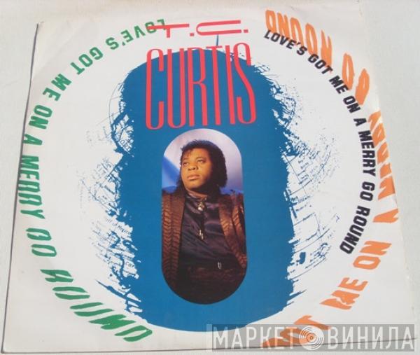 T.C. Curtis - Love's Got Me On A Merry Go Round