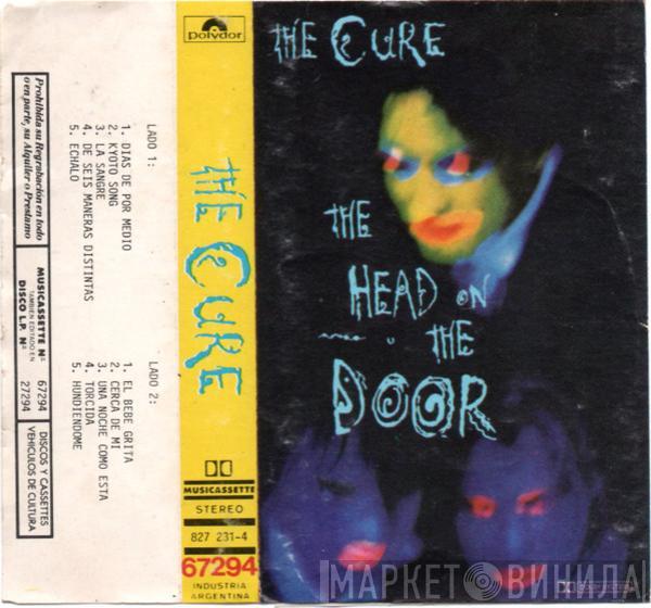  The Cure  - Cabeza Contra La Puerta = The Head On The Door