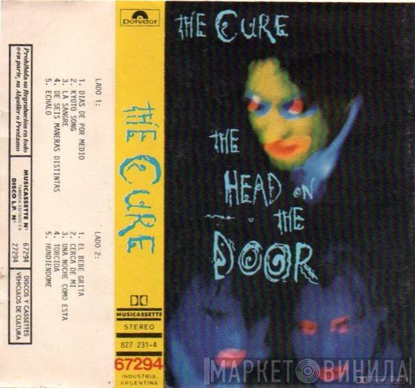  The Cure  - Cabeza Contra La Puerta = The Head On The Door