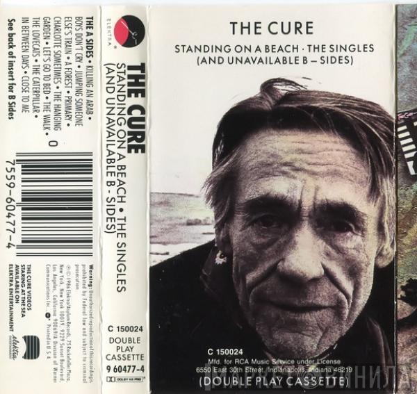  The Cure  - Standing On A Beach • The Singles (And Unavailable B - Sides)