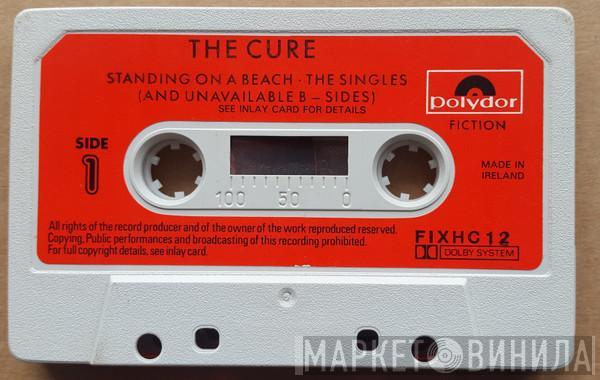 The Cure  - Standing On A Beach • The Singles (And Unavailable B-Sides)