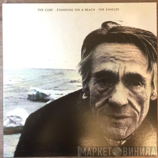  The Cure  - Standing On A Beach • The Singles
