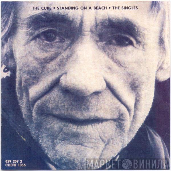  The Cure  - Standing On A Beach • The Singles