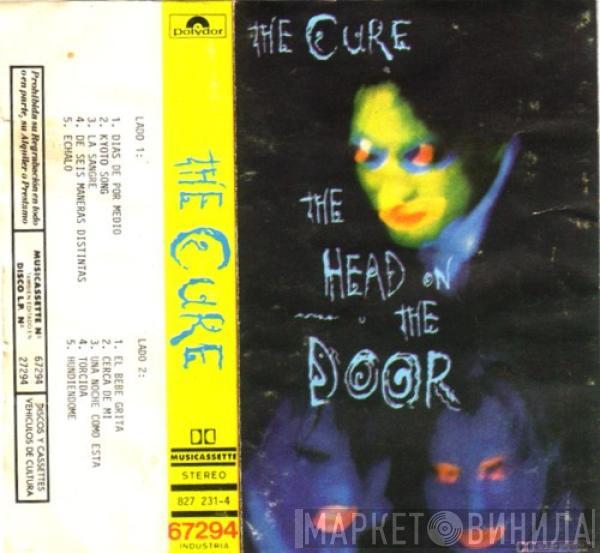  The Cure  - The Head On The Door = Cabeza Contra La Puerta