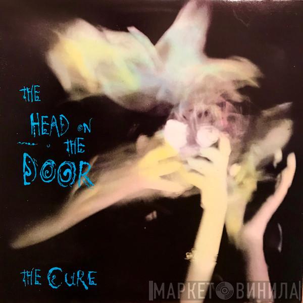  The Cure  - The Head On The Door