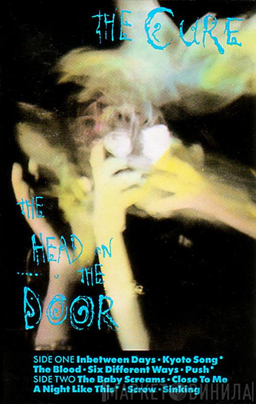  The Cure  - The Head On The Door