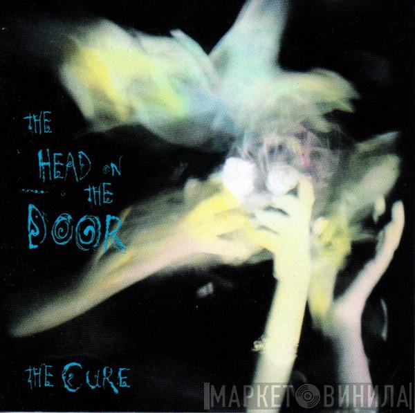  The Cure  - The Head On The Door