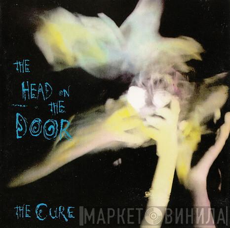  The Cure  - The Head On The Door