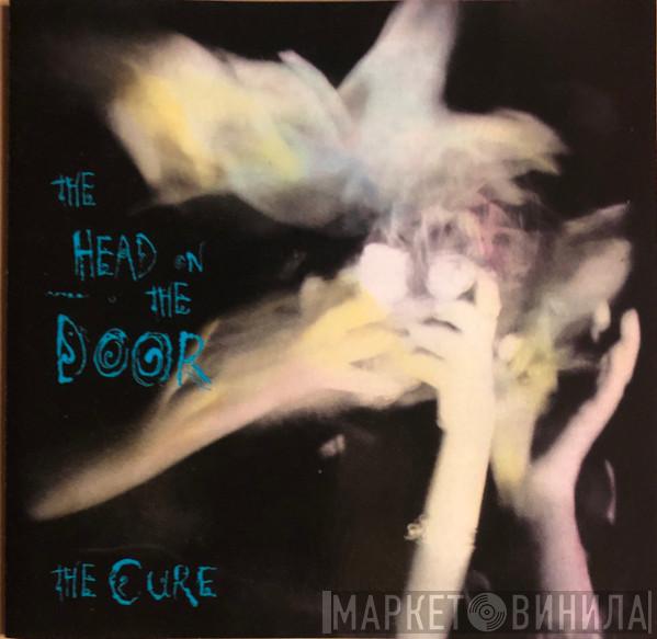  The Cure  - The Head On The Door