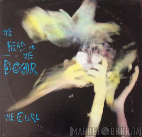  The Cure  - The Head On The Door