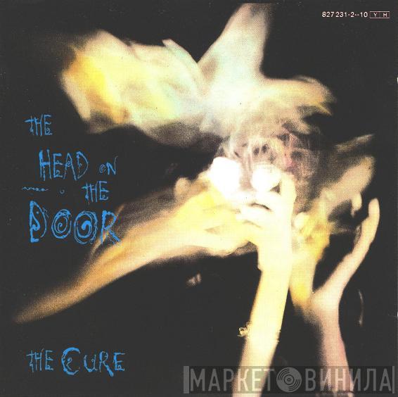  The Cure  - The Head On The Door