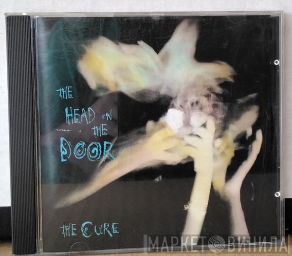  The Cure  - The Head On The Door