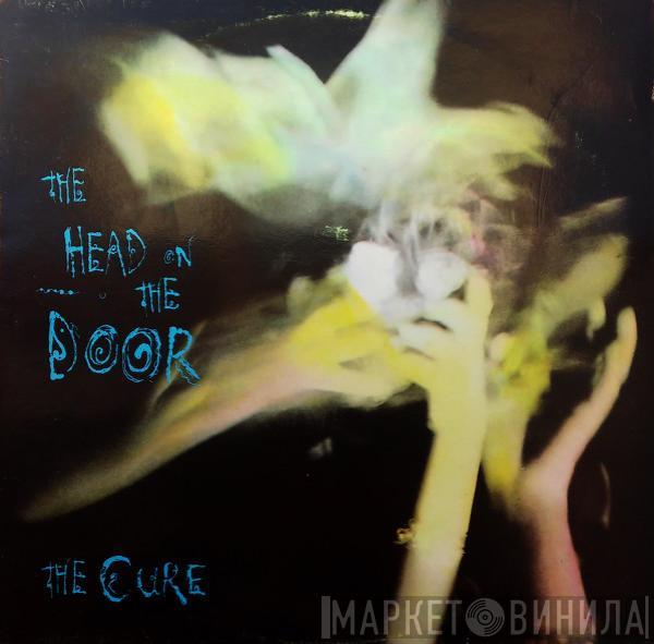  The Cure  - The Head On The Door