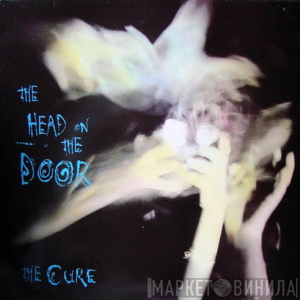  The Cure  - The Head On The Door