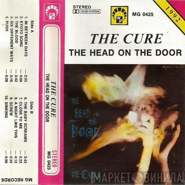  The Cure  - The Head On The Door