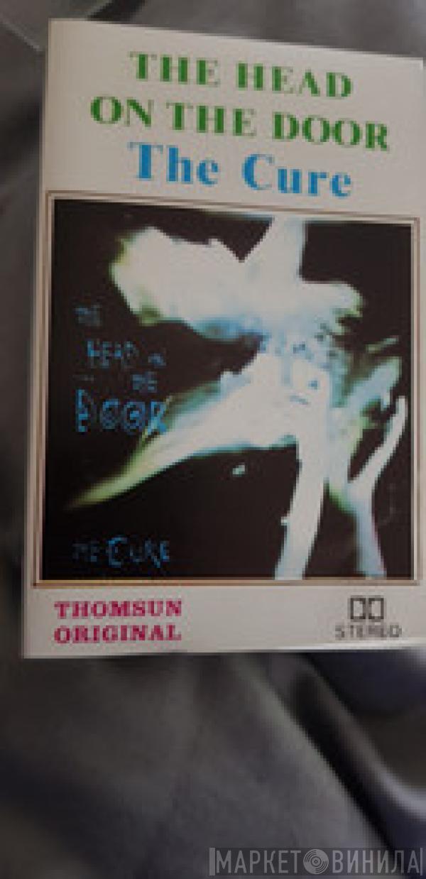  The Cure  - The Head On The Door