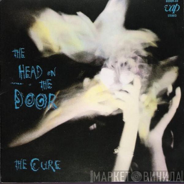  The Cure  - The Head On The Door