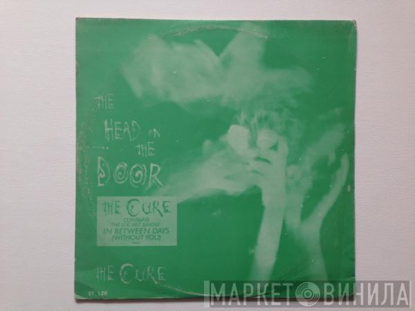  The Cure  - The Head On The Door