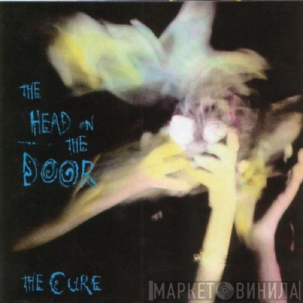  The Cure  - The Head On The Door