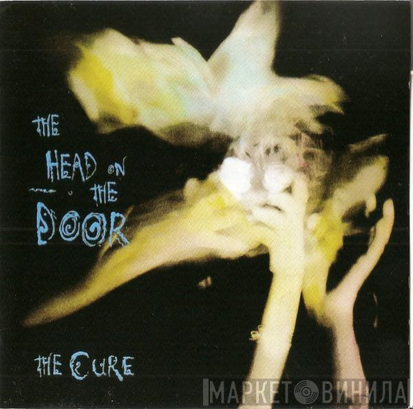  The Cure  - The Head On The Door