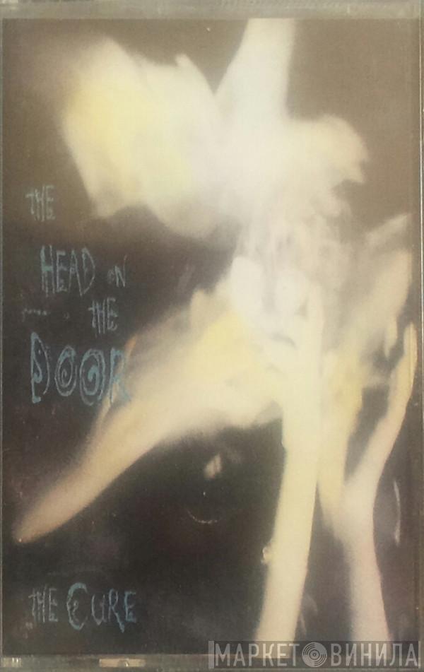  The Cure  - The Head On The Door