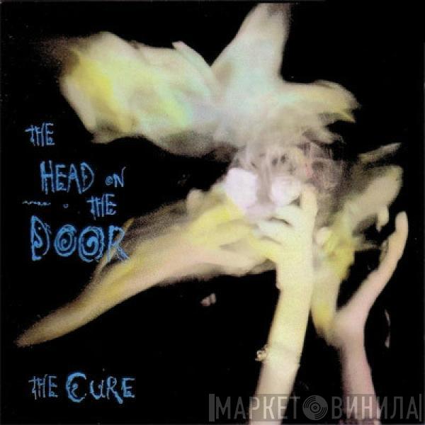  The Cure  - The Head On The Door