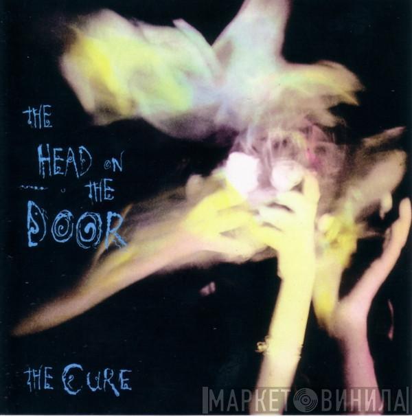  The Cure  - The Head On The Door