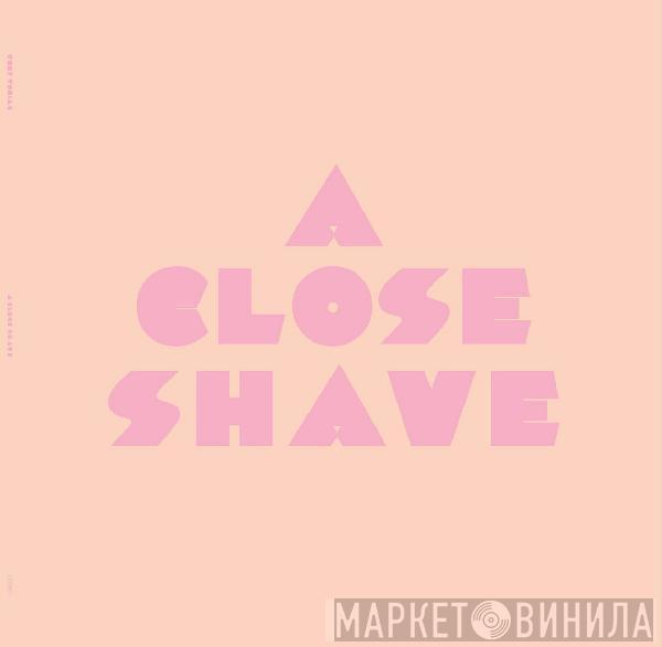 Toby Tobias - A Close Shave